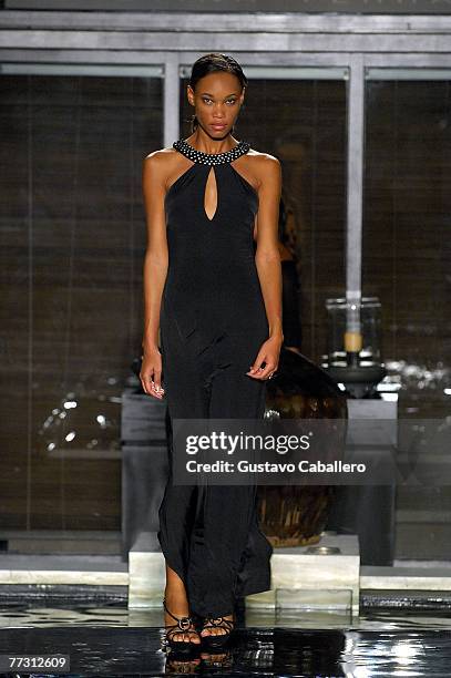 Model walks the runway at the FISICO by Christina Ferrari show at the Setai on October 12, 2007 in Miami Beach, Florida.