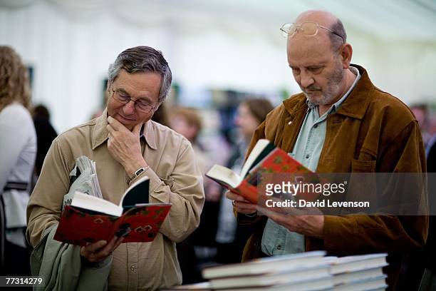 Visitors browse books in the Waterstones book shop at the Cheltenham Literature Festival held at Cheltenham Town Hall on October 13, 2007 in...