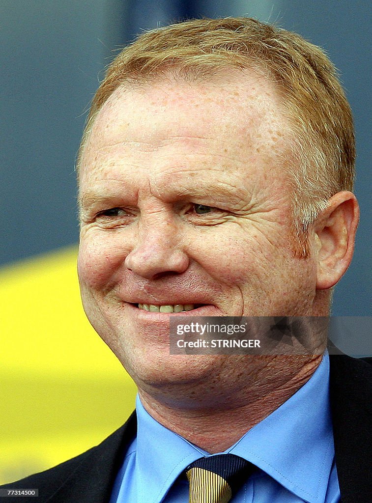 Alex McLeish manager of Scotland watches