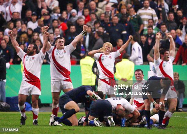 England's hooker George Chuter and teammates celebrate after the rugby union World Cup 2007 semi final match England vs. France at the Stade de...
