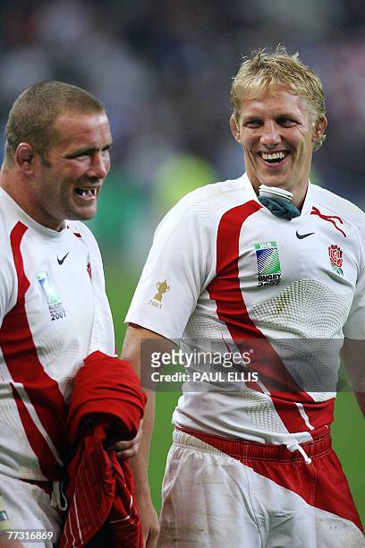 England's prop and captain Phil Vickery and England's flanker Lewis Moody jubilate after the rugby union World Cup semi final match England versus...