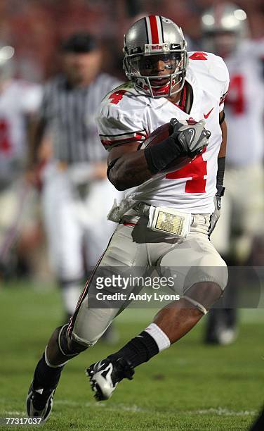 Ray Small of the Ohio State Buckeyes runs with the ball against the Purdue Boilermakers during the game at Ross-Ade Stadium October 6, 2007 in West...