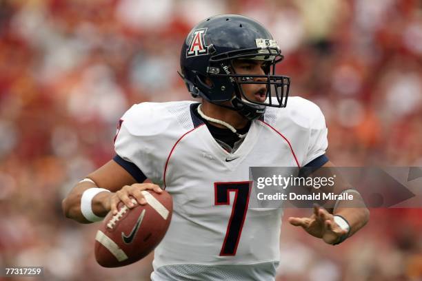 Quarterback Willie Tuitama of the Arizona Wildcats competes against the USC Trojans during the first half of their Pac-10 Conference Game at the Los...