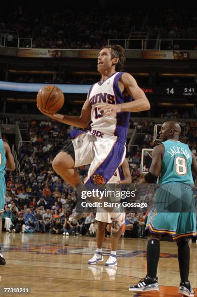 Steve Nash of the Phoenix Suns drives for a layup against the New Orleans Hornets at U.S. Airways Center October 13, 2007 in Phoenix, Arizona. NOTE...