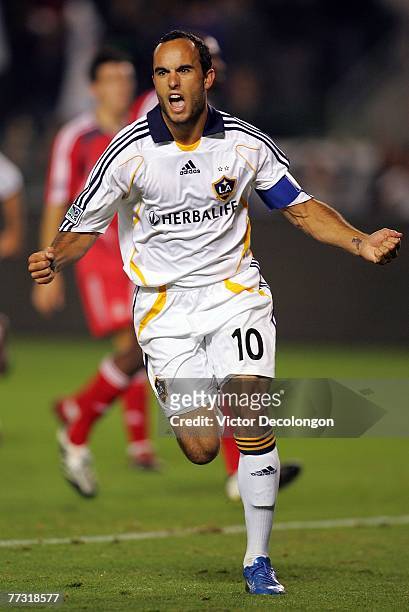Landon Donovan of the Los Angeles Galaxy celebrates after converting on a penalty kick in the second half against Toronto FC during their MLS match...