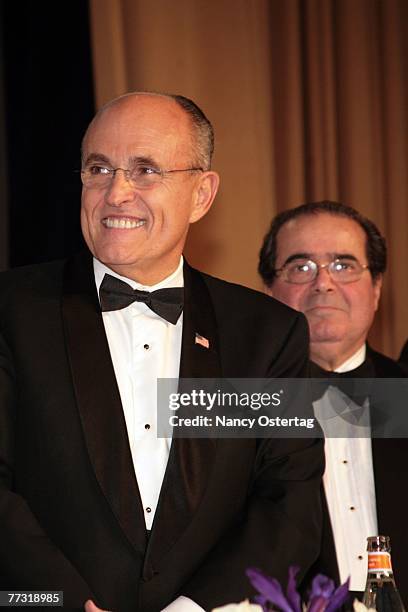 Presidential Candidate Rudy Giuliani and Justice Antonin Scalia are seen on stage at NIAF's 32nd Anniversary Awards Gala on October 13, 2007 in...