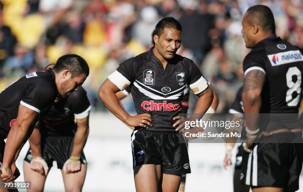 Dene Halatau , Paul Whatuira and Roy Asotasi of the Kiwis show their disappointment after Australia scored during the Centennial Test match between...