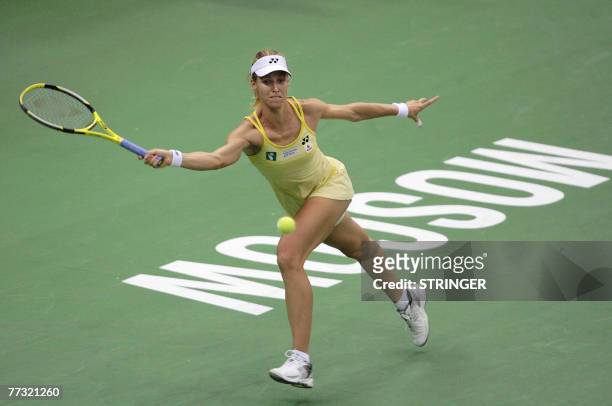 Russian Elena Dementieva returns the ball to Serena Williams of USA during the final of the Kremlin Cup women's tennis tournament in Moscow, 14...