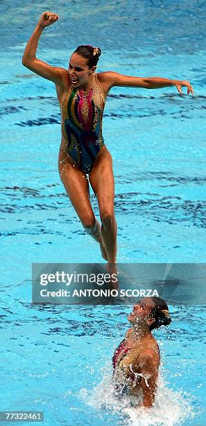 Members of Mexico's synchronized swimming team perform during their combination routine, 14 October 2007, in the Synchronized Swimming World Trophy...