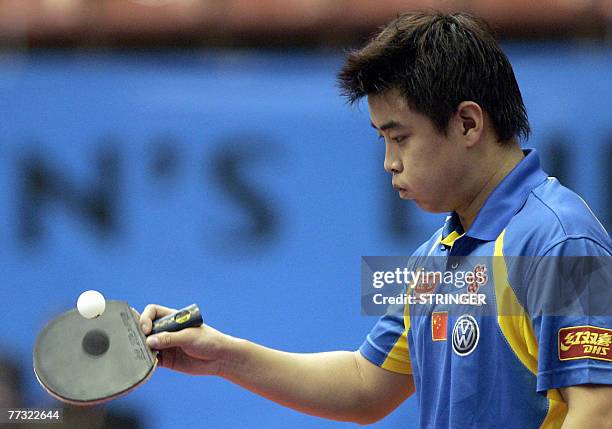China's Wang Hao gestures after his Table Tennis Men World Cup final match against Korean Ryu Seung Min , 14 October 2007 in Barcelona. Hao won...