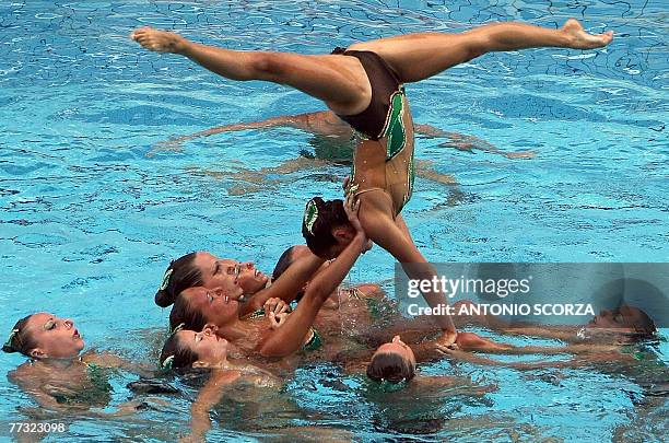 Italy's synchronized swimming team perform during their combination routine, 14 October 2007, in the Synchronized Swimming World Trophy 2007 at the...