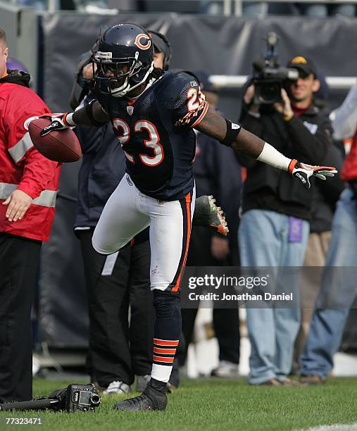 Devin Hester of the Chicago Bears celebrates in the end zone after catching an 81 yard touchdown pass in the 4th quarter against the Minnesota...