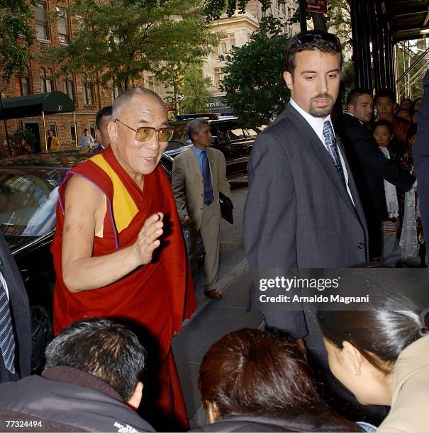 The Dalai Lama arrives at an upper east side hotel on October 14, 2007 in New York City. HIs Holiness is visiting New York before leaving to...