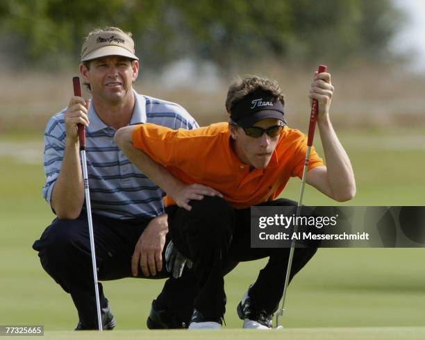 Aaron Stewart, son of Payne Stewart, and Lee Janzen lines up a putt during final-round play in the Office Deport Father/Son Challenge at...