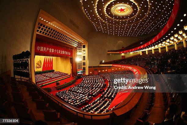 Chinese delegates attend the opening session of the five-yearly Chinese Communist Party Congress at the Great Hall of the People October 15, 2007 in...