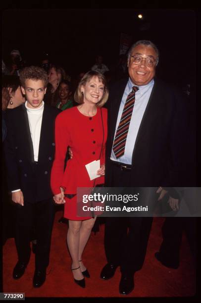 Actor James Earl Jones, his wife and son Flynn attend the premiere of the film "Cry, the Beloved Country" at the Ziegfeld Theatre October 23, 1995 in...