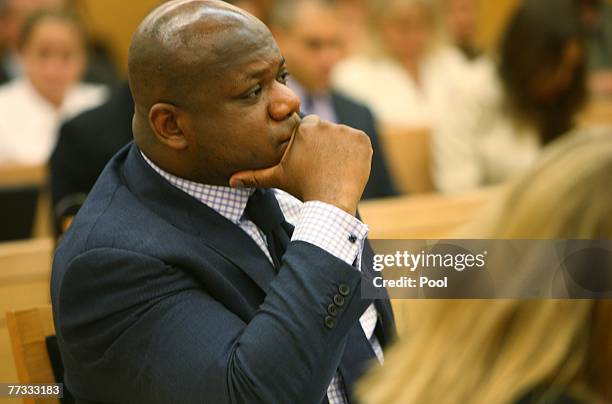 Assistant District Attorney Joseph Alexis listens to defense opening statements at the start of the murder trial of Roy Lindley DeVecchio in state...