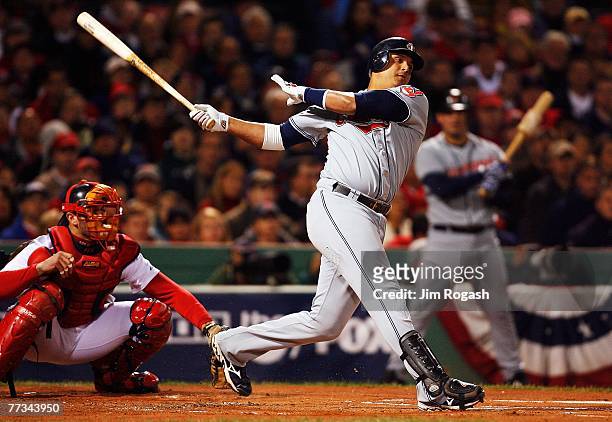 Victor Martinez of the Cleveland Indians hits a double to score teammate Grady Sizemore in the first inning of Game Two of the American League...