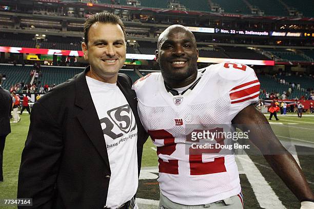 Agent Drew Rosenhaus poses with Reuben Droughns of the New York Giants after the game against the Atlanta Falcons at Georgia Dome on October 15, 2007...