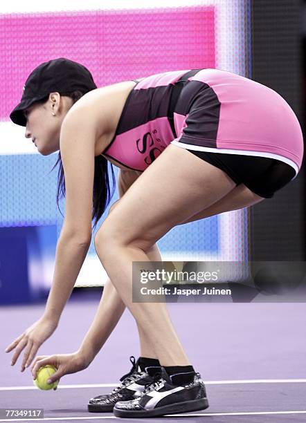 Ball girl picks up a tennis ball during the ATP Masters Series tennis tournament match between Andy Murray and Radek Stepanek on October 15, 2007 in...