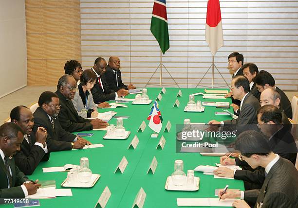 President of the Republic of Namibia, Hifikepunye Pohamba and Japanese Prime Minister Yasuo Fukuda attend a general meeting at the Prime Ministers...