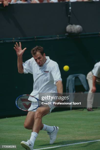 Canadian born British tennis player Greg Rusedski pictured in action during competition to reach the fourth round of the Men's Singles tennis...