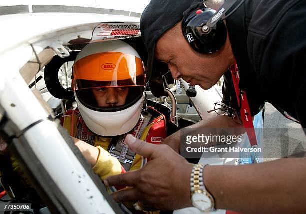 Driver Chris Bristol, left, confers with Wendell Scott, Jr. During the NASCAR Drive for Diversity combine at South Boston Speedway October 16, 2007...