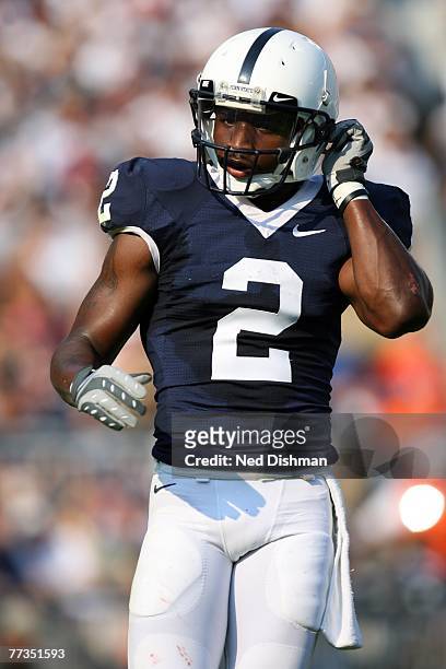 Wide receiver Derrick Williams of the Penn State Nittany Lions adjusts his helmet against the University of Iowa Hawkeyes at Beaver Stadium on...