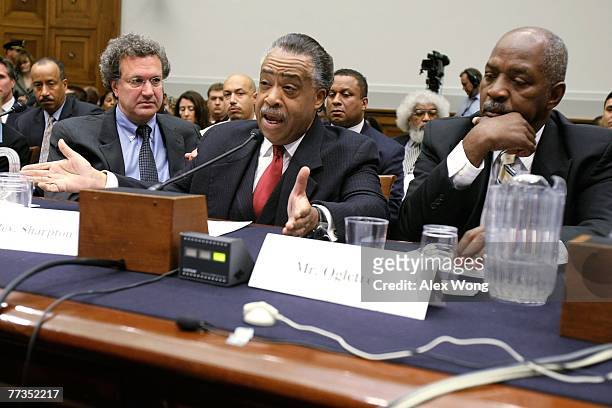 National Action Network President the Rev. Al Sharpton testifies as Southern Poverty Law Center President and CEO Richard Cohen and Charles Hamilton...