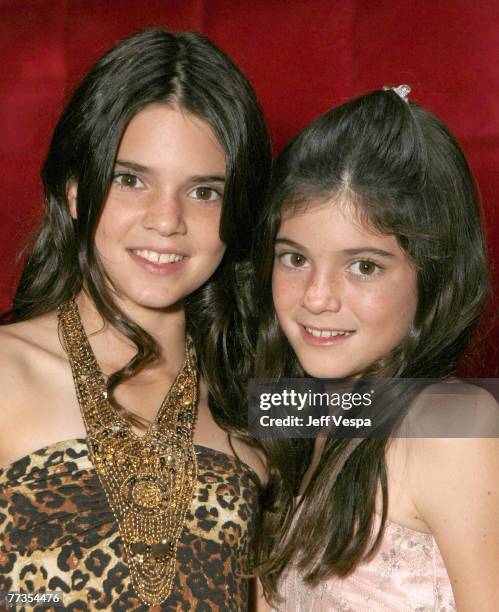 Kendall Jenner and Kylie Jenner pose for a photo at the "Keeping Up With the Kardashians" viewing party at Chapter 8 Restaurant on October 16, 2007...