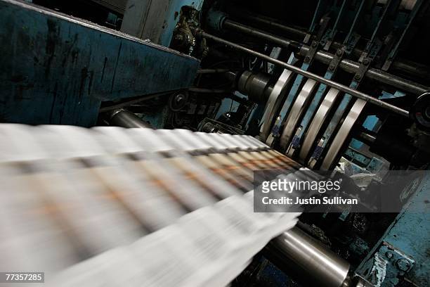 Freshly printed copies of the San Francisco Chronicle roll off the printing press at one of the Chronicle's printing facilities September 20, 2007 in...