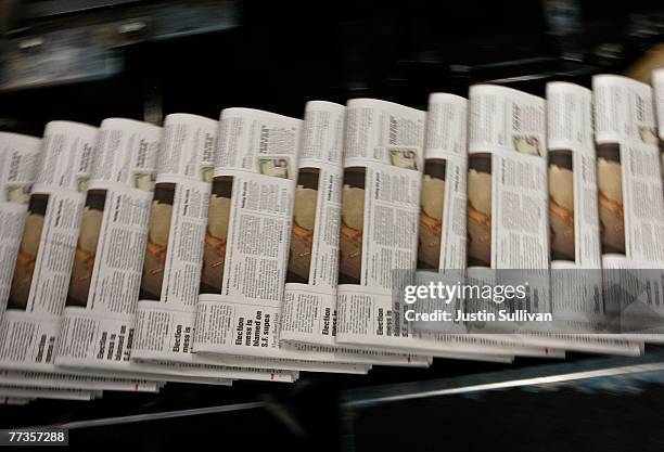 Freshly printed copies of the San Francisco Chronicle roll off the printing press at one of the Chronicle's printing facilities September 20, 2007 in...