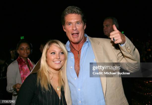 Actor David Hasselhoff and daughter Hayley Amber Hasselhoff talk to the media in the front row at the Christian Audigier Spring 2008 fashion show...