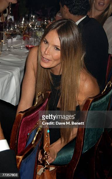 Elle Macpherson attends the launch of Kate Moss's new Top Shop 'Christmas Range' collection at Annabel's October 16, 2007 in London, England.