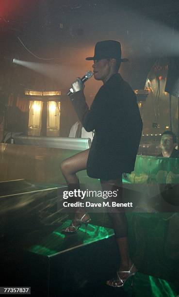 Singer Grace Jones performs at the launch of Kate Moss's new Top Shop 'Christmas Range' collection at Annabel's October 16, 2007 in London, England.