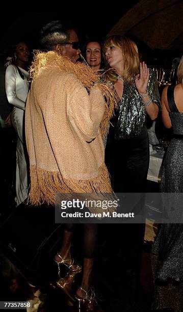 Grace Jones and Kate Moss attend the launch of Kate Moss's new Top Shop 'Christmas Range' collection at Annabel's October 16, 2007 in London, England.