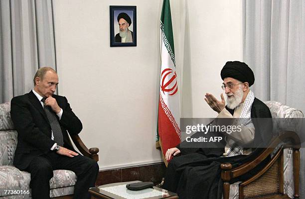 Picture made available 17 October 2007 shows Russian President Vladimir Putin meeting with Iranian supreme leader Ayatollah Ali Khamenei in Tehran,...