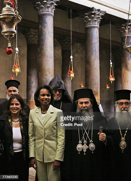 Secretary of State Condoleezza Rice stands with Greek Orthodox priests during her visit to the Church of Nativity on October 17, 2007 in Bethlehem,...
