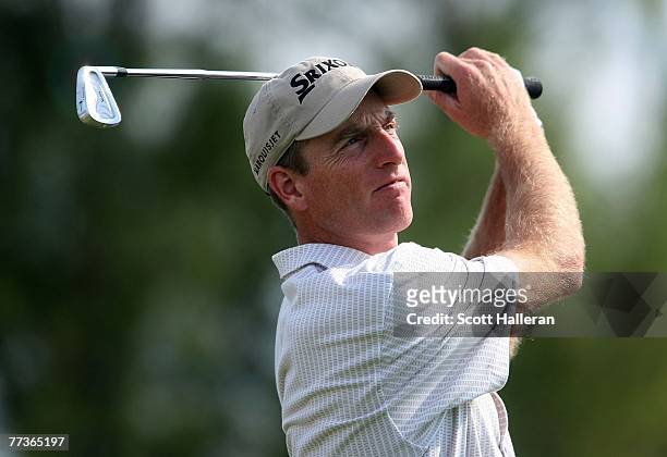 Jim Furyk watches his tee shot on the third hole during the final round of PGA Grand Slam at the Mid Ocean Club on October 17, 2007 in Tucker's Town,...