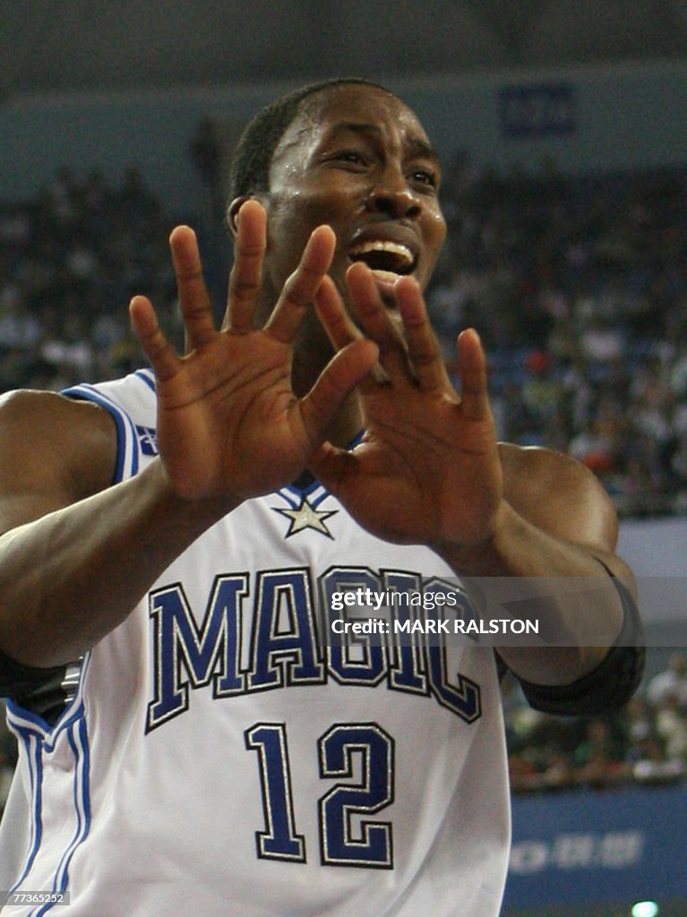 Orlando Magic player Dwight Howard gestu