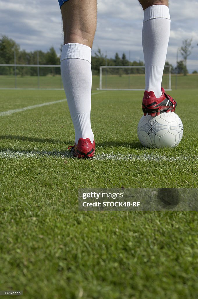 Kicker's foot standing on ball