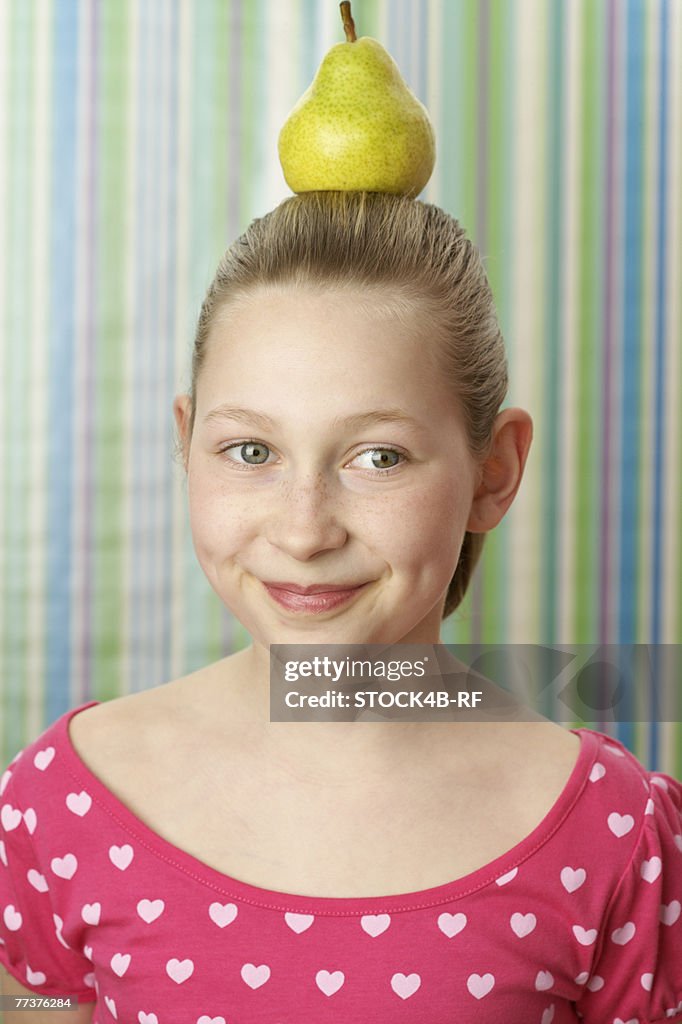 Girl with pear on top