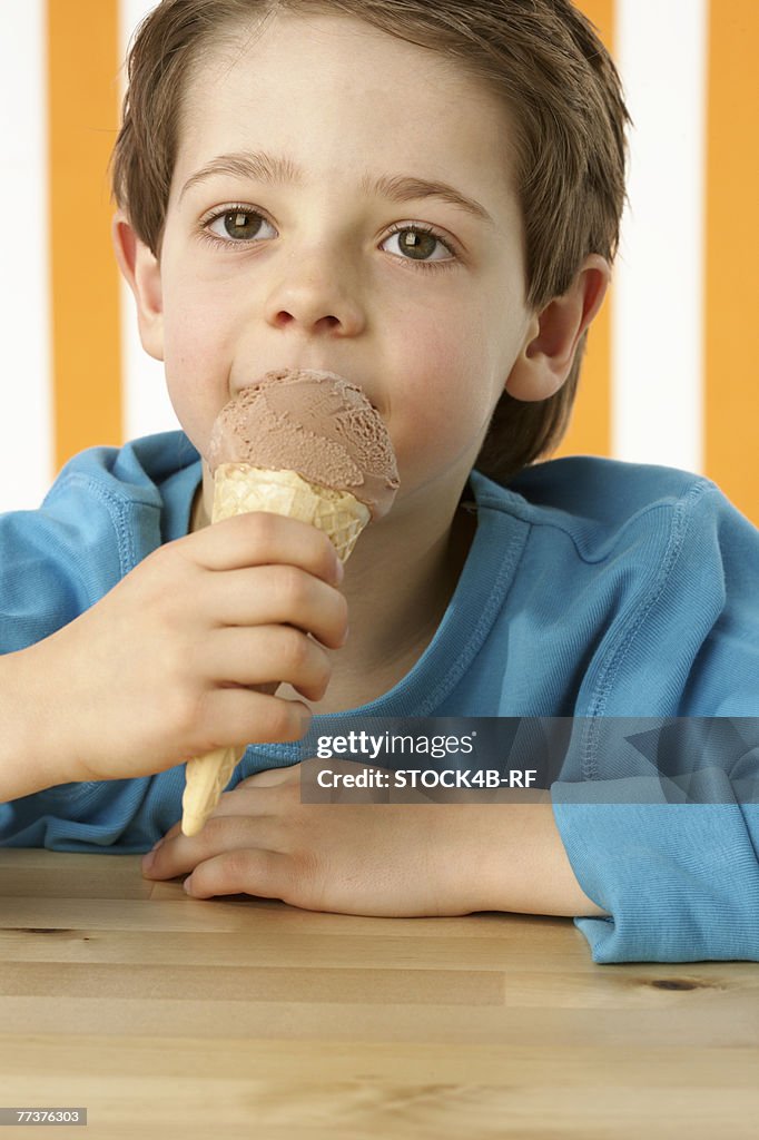 Boy eating ice