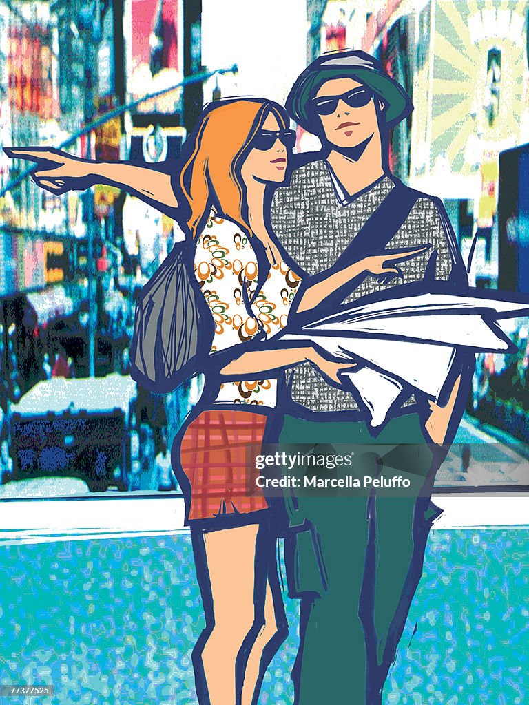 Two tourists exploring a city with a map