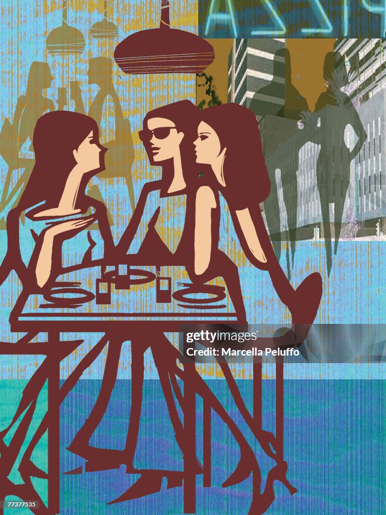 Three women having lunch in a restaurant