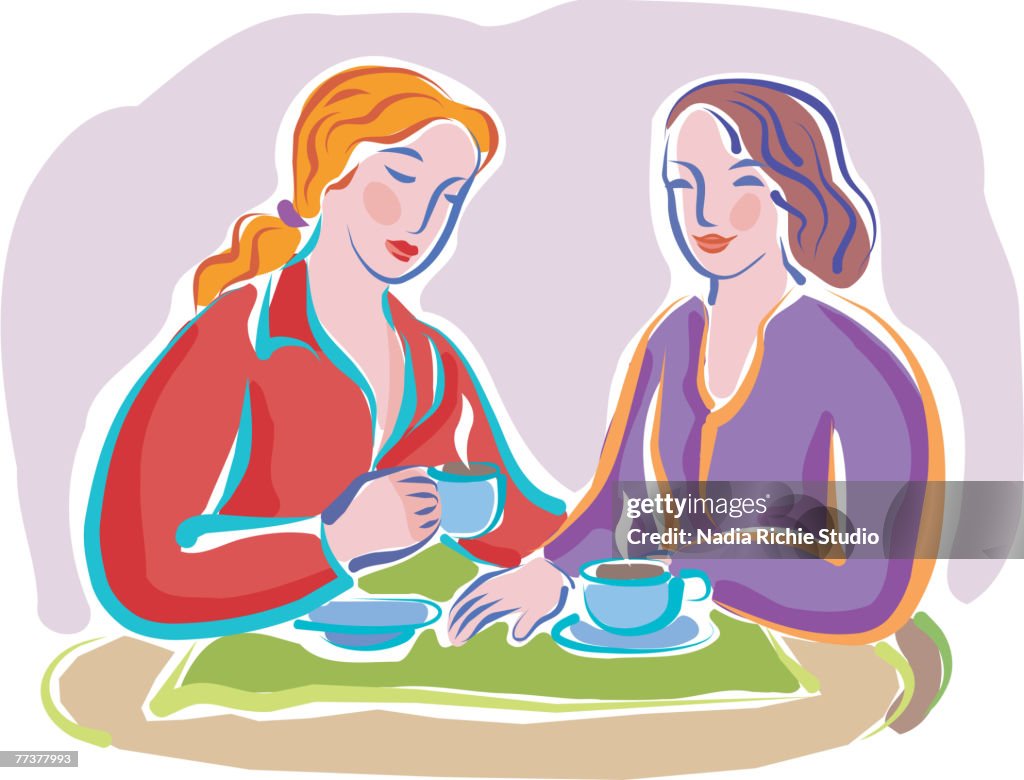 Two friends chatting over tea