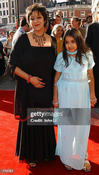 Writer Meera Syal and her daughter Millie attend the Bombay Dreams world premiere at the Apollo Victoria Theatre June 19, 2002 in London, England.