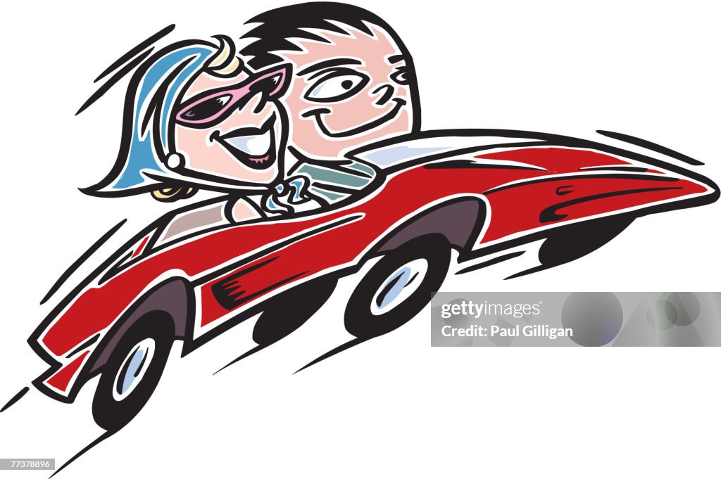 A couple going for a spin in a red sports car