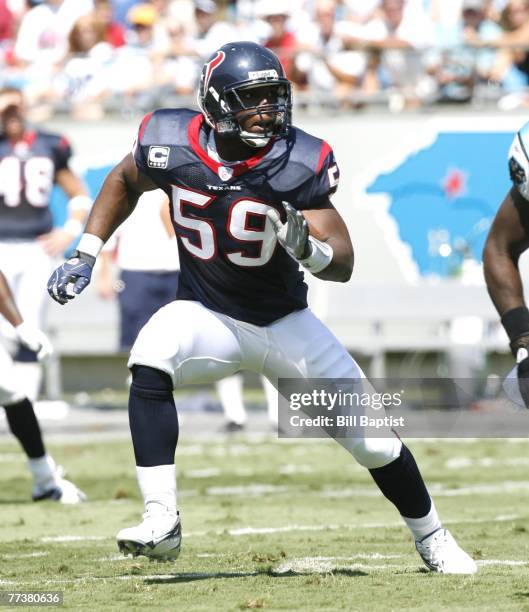 Line backer DeMeco Ryans of the Houston Texans runs during a game against the Carolina Panthers at Bank of America Stadium on September 16, 2007 in...