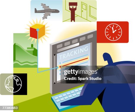 A man tracking shipments using a computer A man tracking shipments using a computer